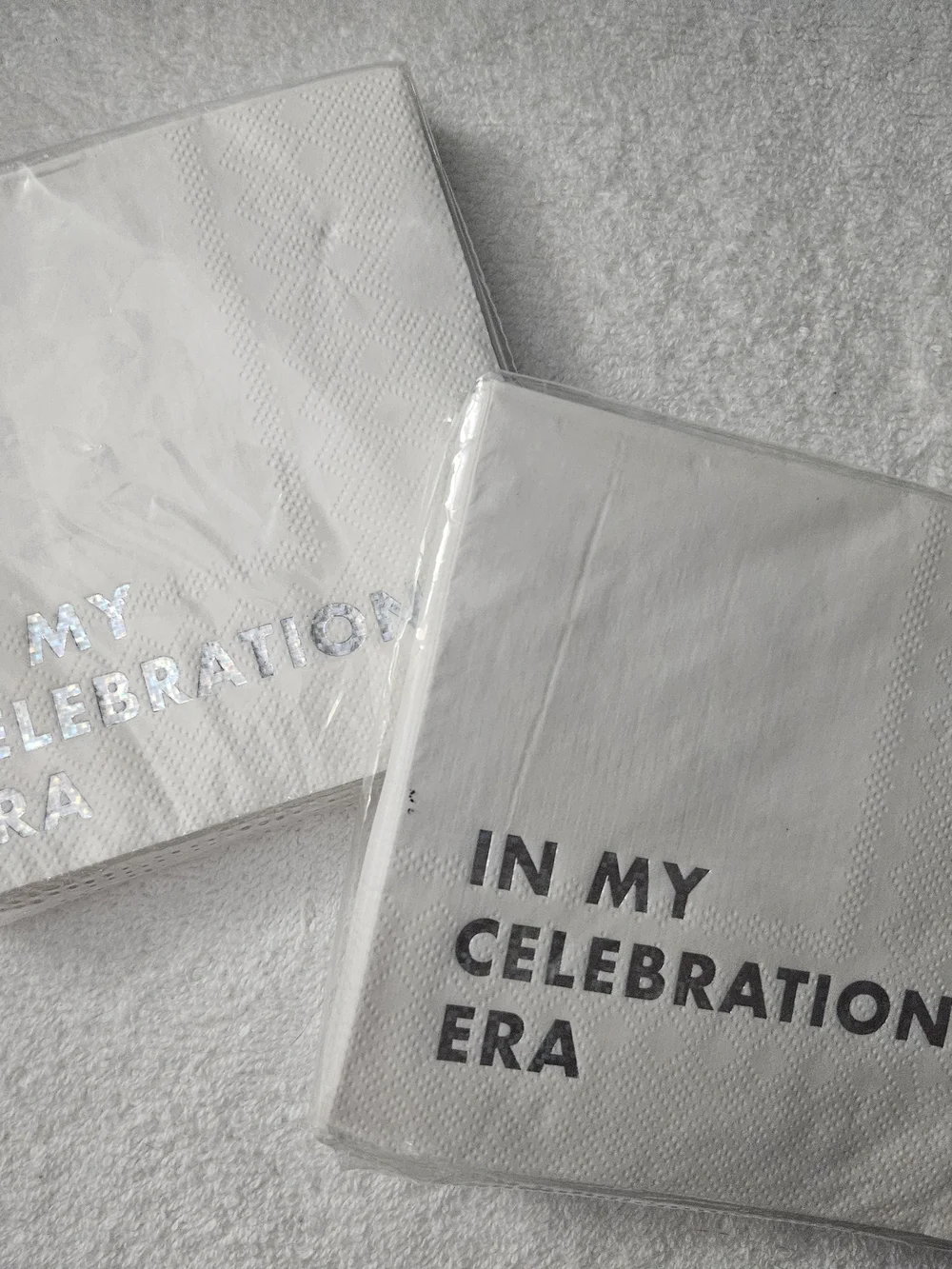 Spritz White Party Napkins with Holographic Silver Text 'In My Celebration Era'